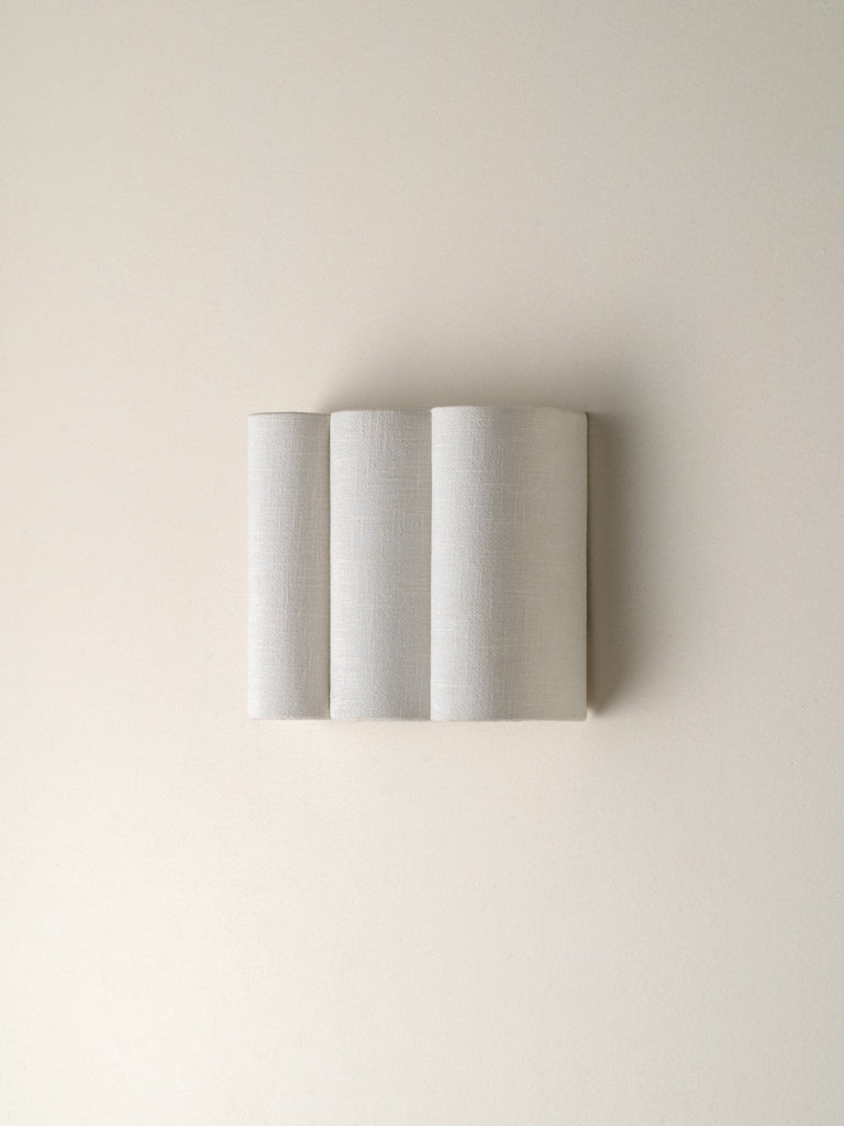 FOLIA - SCALLOPED NATURAL LINEN WALL LIGHT - THE LOOM COLLECTION